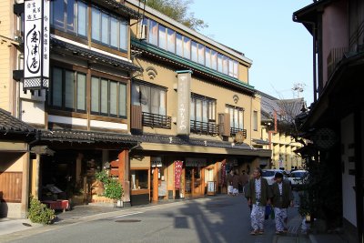 Bathers strolling past the ryokan and shops