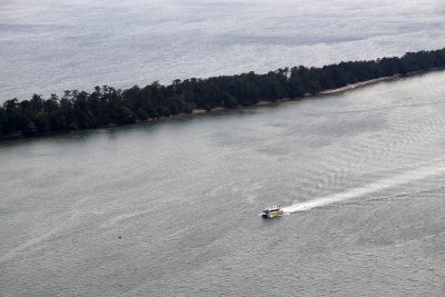 Boat sailing past the spit