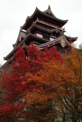 Autumn leaves with the donjon of Fushimi-jō