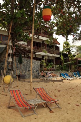 Beach chairs in back of The Lodge