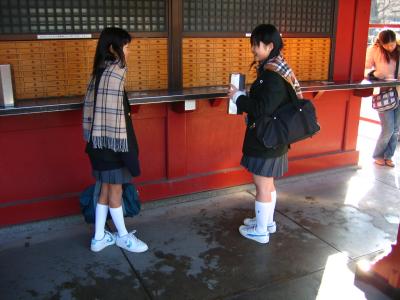 High school girls getting omikuji