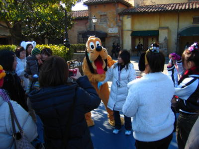 Pluto accosting a baffled girl