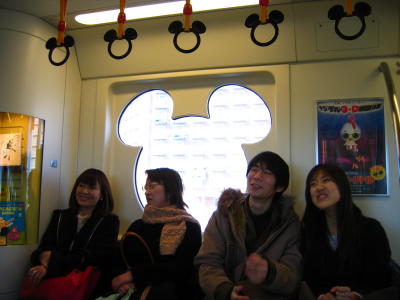 Happy passengers on the monorail in
