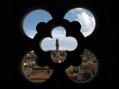Palazzo Vecchio tower viewed through a window