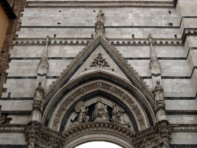 Detail above a lesser entryway into Siena's Duomo