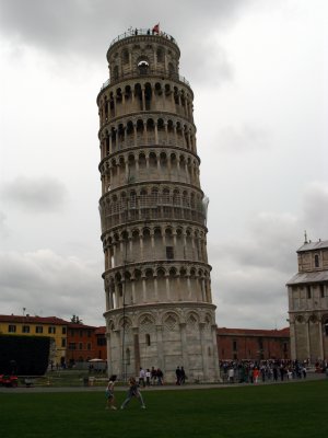 Visitors playing in front of the Leaning Tower