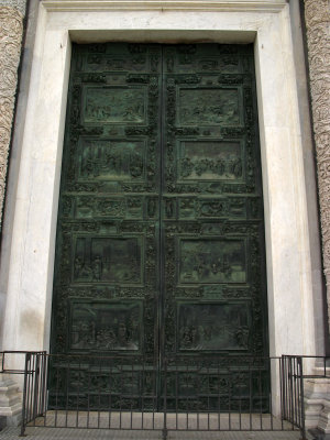 Massive bronze doors on the Duomos exterior