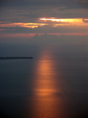 Rays of the sunset on the water