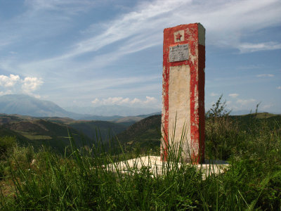 Communist-era marker along the road