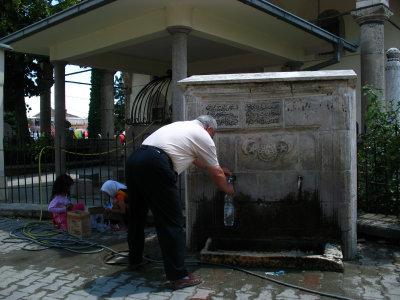 Filling up the water bottle at the Bajrakli Mosque