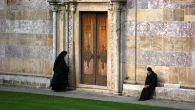 Monks outside the church