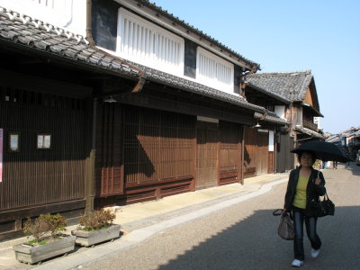 Woman with parasol in Seki-juku