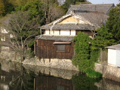 Decaying old house beside a pond, Kameyama
