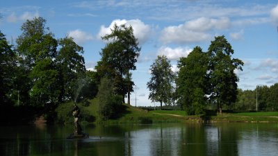 Fountain and trees on the far side of the pond