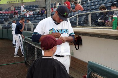 Ry throws the first pitch at an AquaSox game