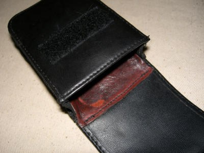 New inside leather flap sewn on, simple and effective.