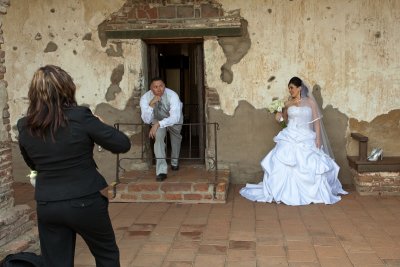 016_Photographer, bride, posing groom__6531`1001091413.jpg