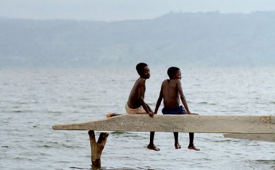 Two kids on a log, Lake Bosomtwi