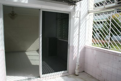 Before: Living room from patio