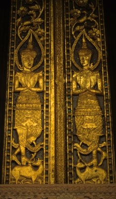 Carved  and gilded, tipical Laotian temple doors.