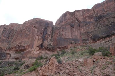 Red sandstone walls along the river