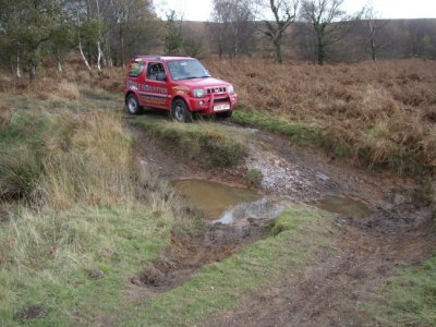 RED JIMNY DIRT 1 T REG.jpg