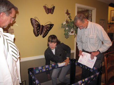 Assembling crib Part II -- Reinforcements have been brought in.