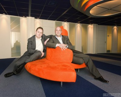 Two managers from a Dutch telecommunications company