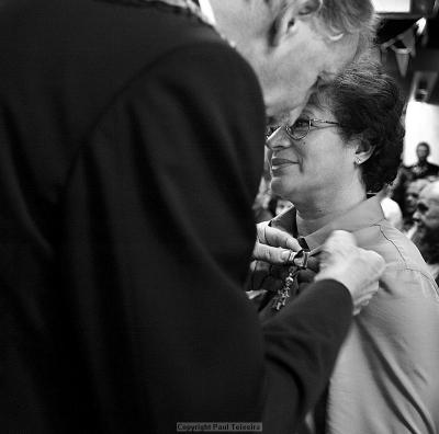 Handing the Dutch Queens medals to outstanding citizens