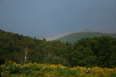Rainbow Mantle over Mountains