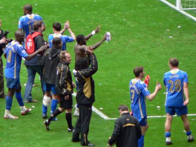 Team celebrate with fans