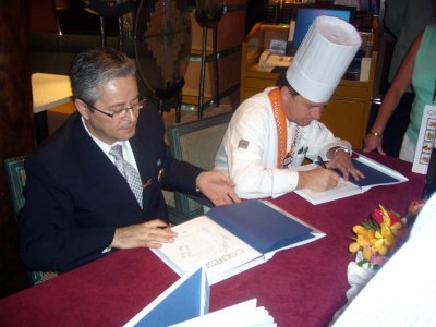The Corporate Executive Chef & Maitre D'Hotel sign book
