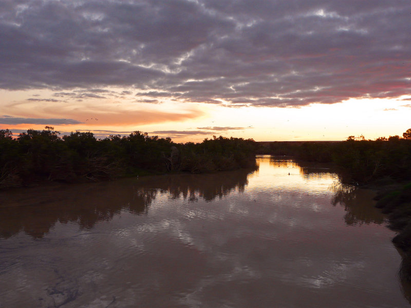 Sunset over outback waterway 
