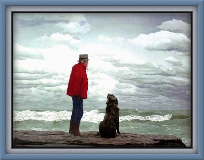 A man and his dog by the sea.