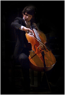 Young cello virtuoso Jan Bogdan playing at the Sacré-Coeur in Brussels