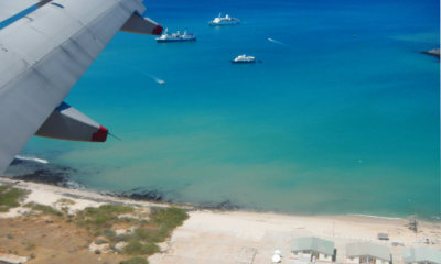 Landing at Baltra, M/V Galapagos Legend at top