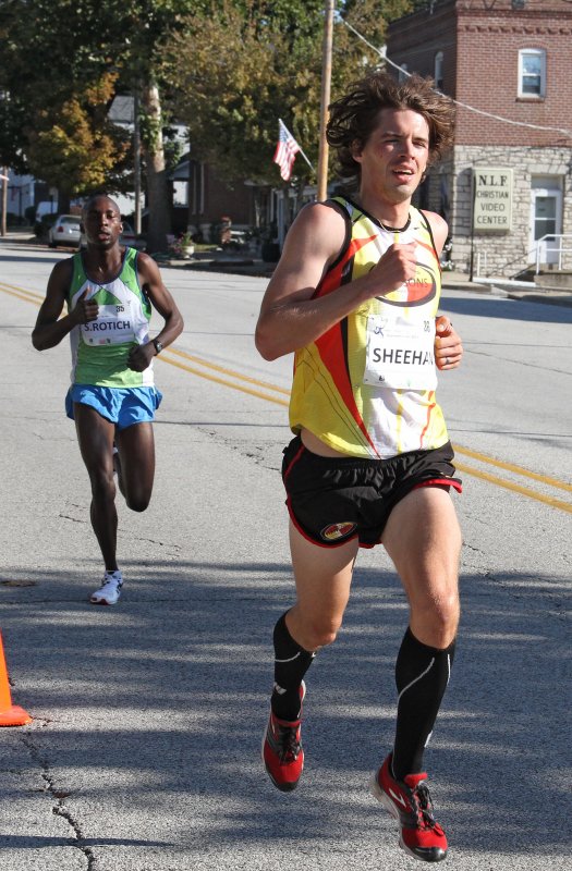 Ryan Sheehan (18th in 14:51) and Sammy Rotich (17th in 14:44)