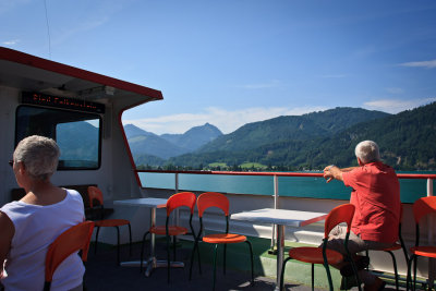 on the ferry to St. Wolfgang, a couple enjoys the view