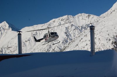 Bell 205 between the propane crapper stacks