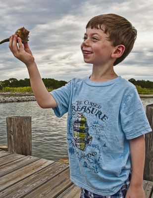 Eli Admires A Hermit Crab 2