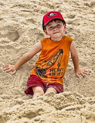 Up To His Feet In The Sand