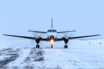 ...finishing the landing roll out on a cold day at Points North Landing, SK