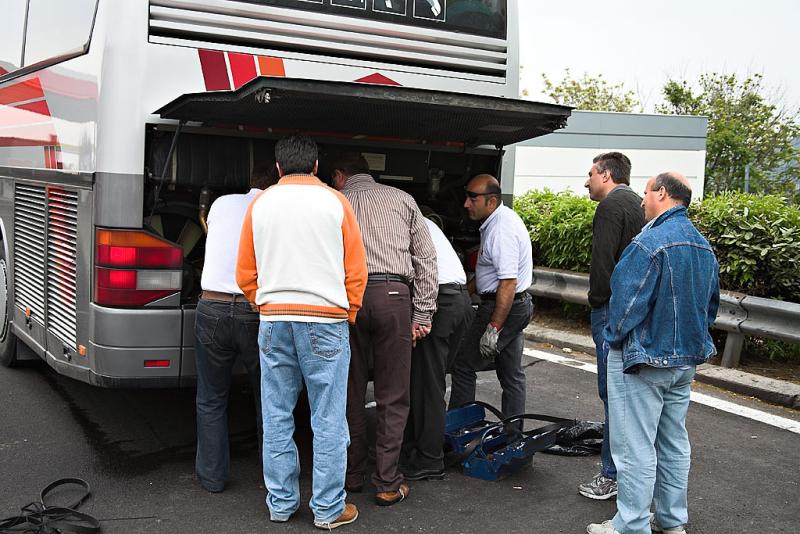 How many Italians does it take to replace a fan belt?