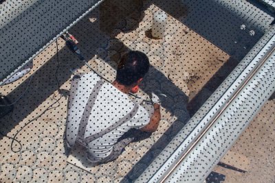 Acropolis museum - cleaning mosaic under the floor