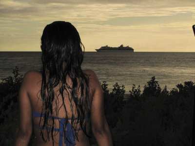 cruiseship leaving Curacao at Sunset.