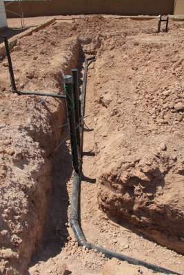 Water line trenches are 2 ft. deep - to avoid having hot water in the cold water lines