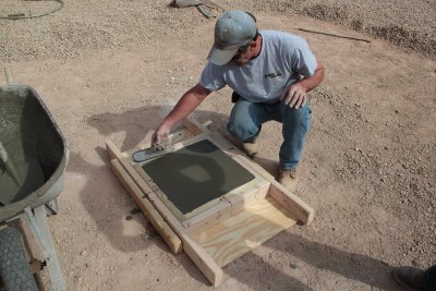 Mike McMahon putting the finishing touches on the pier base