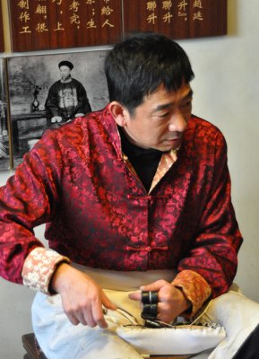 Traditional slipper maker from Beijing