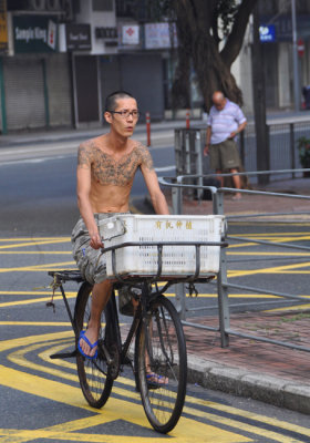 Tattoo man delivering fresh fish