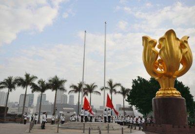 Official raising of HK and China flags